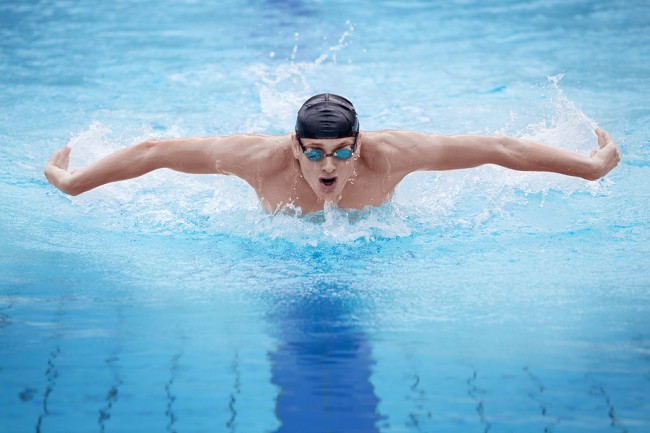  Stock photo of swimmer in cap. 