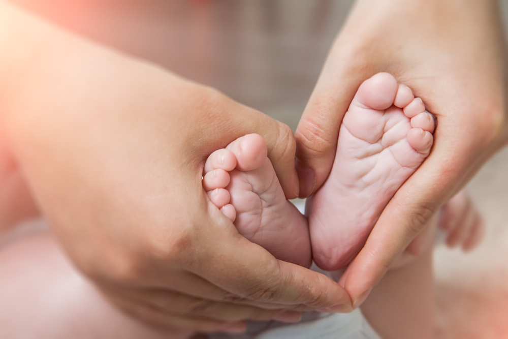  Stock photo of baby feet in a heart shape. 