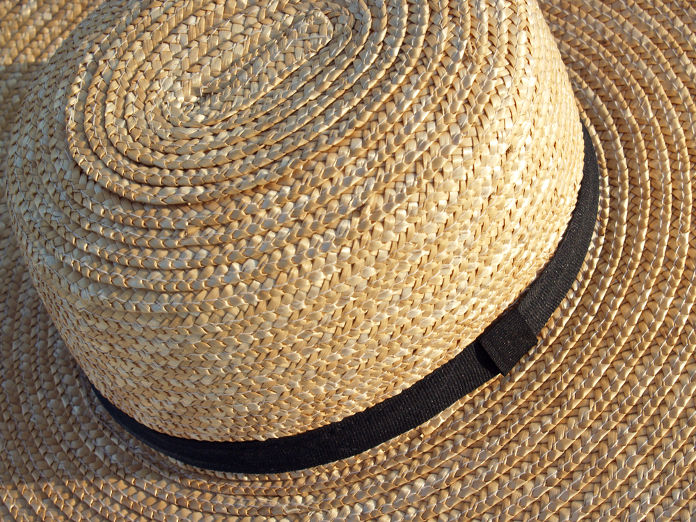  Stock photo of a straw Amish hat. 